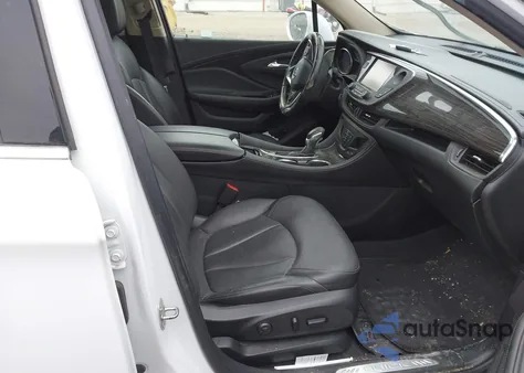 2018 Buick Envision Essence z USA, uszkodzony, nr VIN LRBFX1SA9JD005899